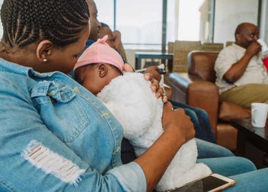 Breastfeeding mother sitting in coffee shop