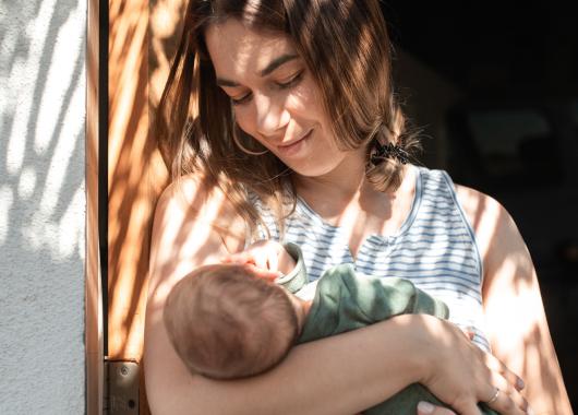 Mother smiling at her baby