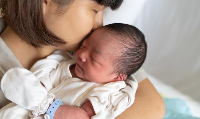 Mother holding newborn