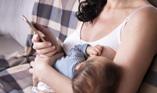 Milk flows from woman breast. Close up video of nipple. Breastfeeding.