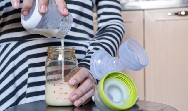 pouring breastmilk