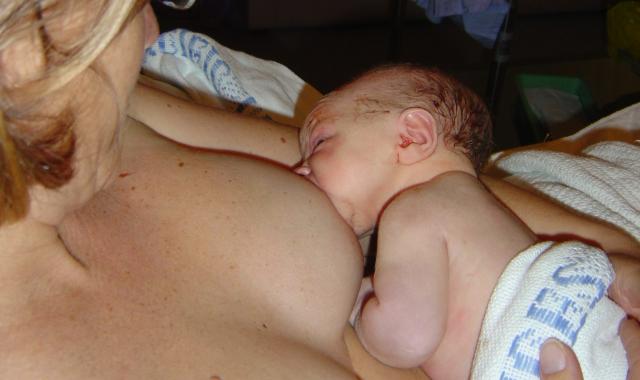 How to help your baby attach and breastfeed