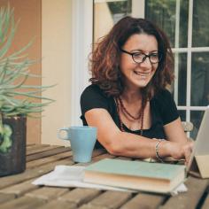 A woman attends an online learning session